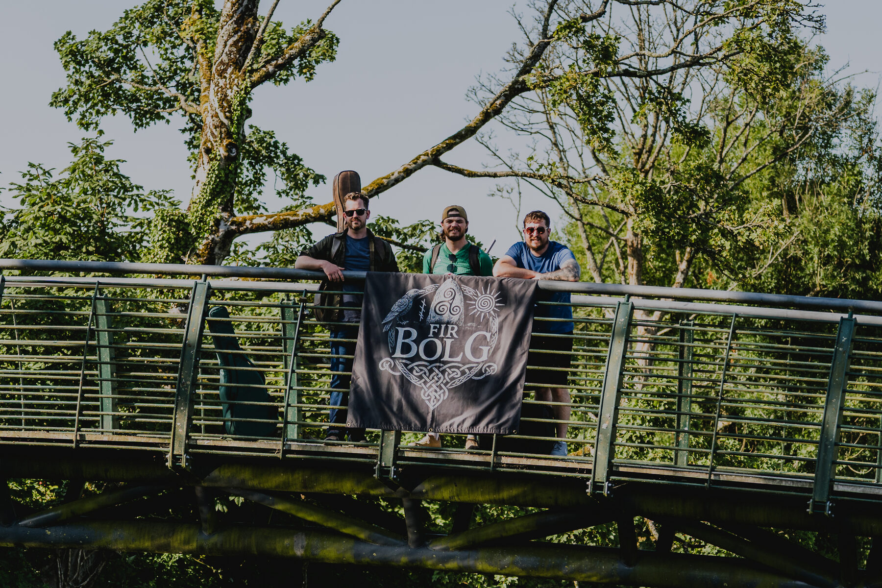 Fir Bolg on a bridge with their band banner