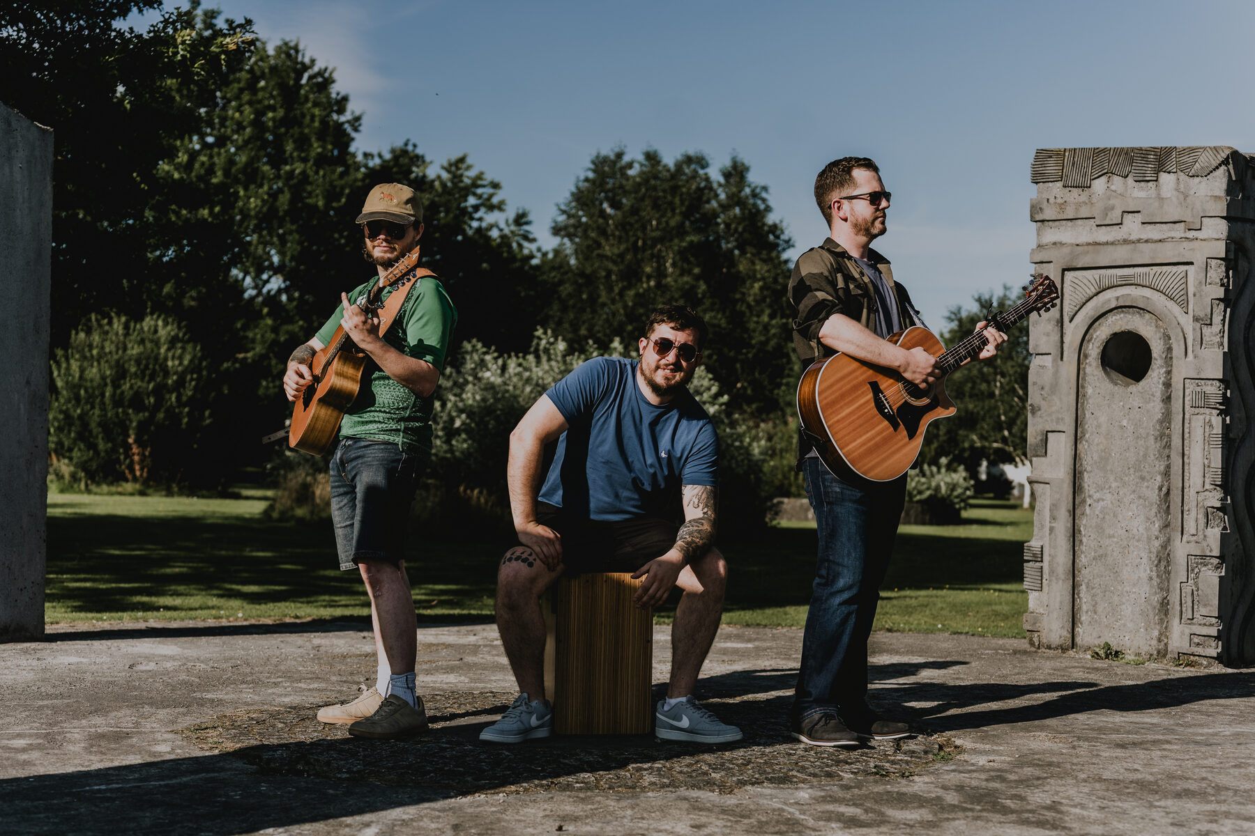 Fir Bolg with guitar, whistle and cajon